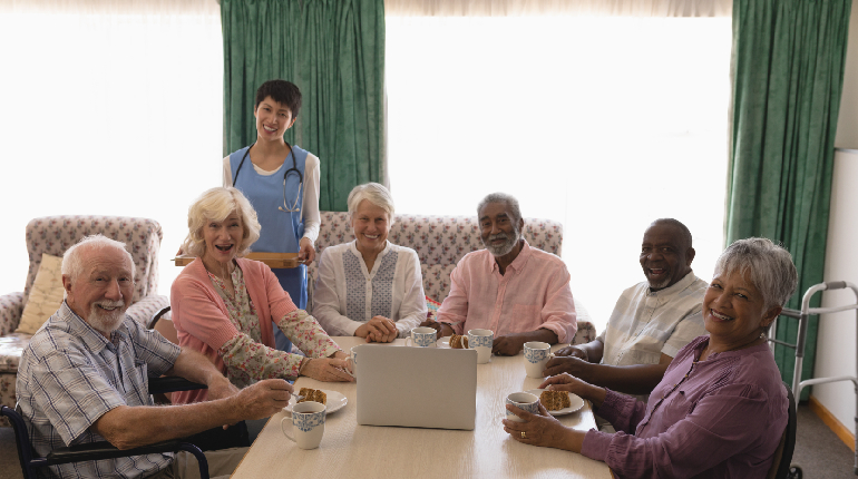 Active seniors enjoying a social gathering at an independent living home for elderly in India